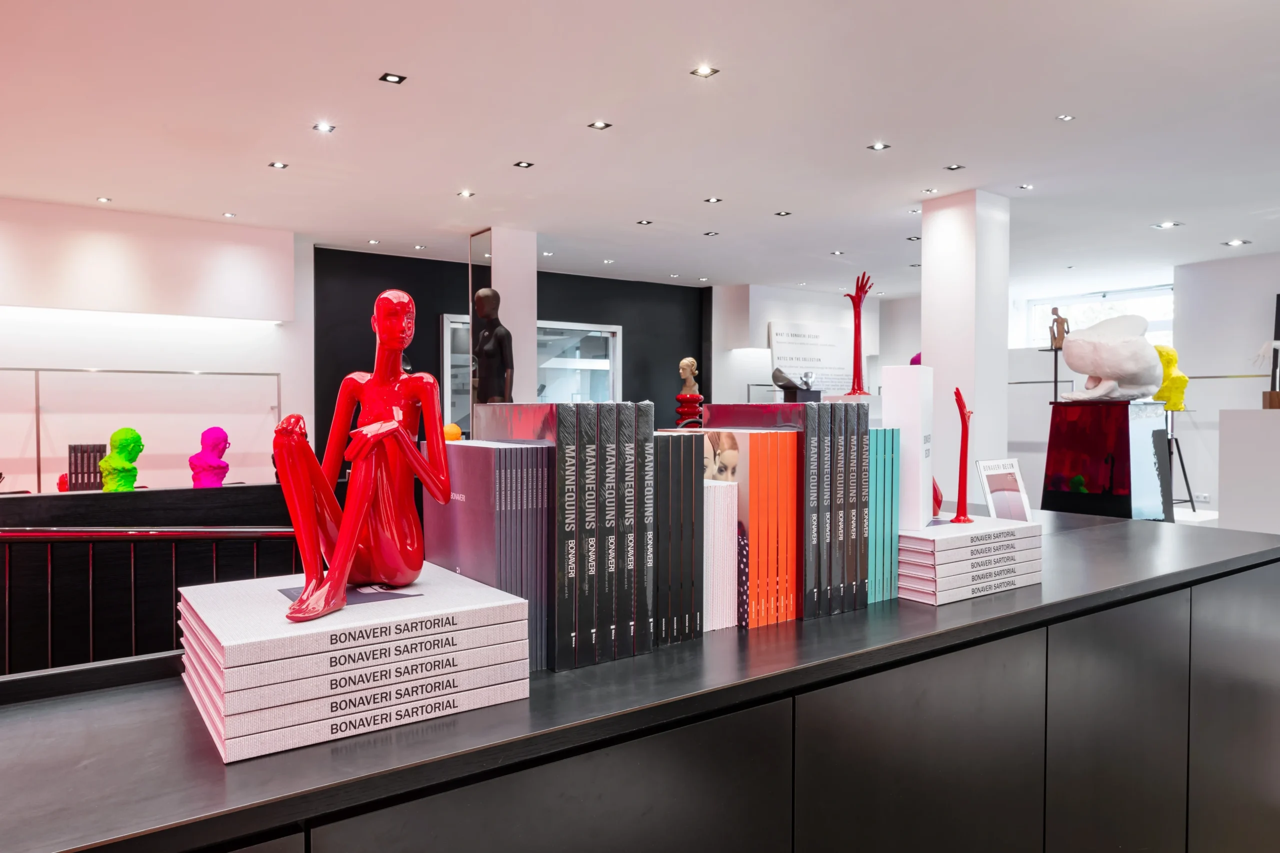 bonaveri-euroshop-2026-red-mannequins-with-sartorial-books-scaled